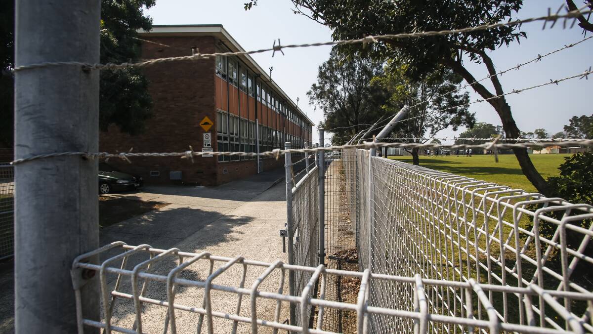 THEN: This barbed wire fencing around Corrimal High School has been removed. Picture: Anna Warr