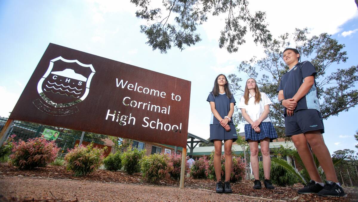 .IMPROVED LOOK: Corrimal High students Suzanne Abou Shalah, Chiahni Zulian and Ngakau Jenner at the front of the school's new gardens. Picture: Adam McLean.
