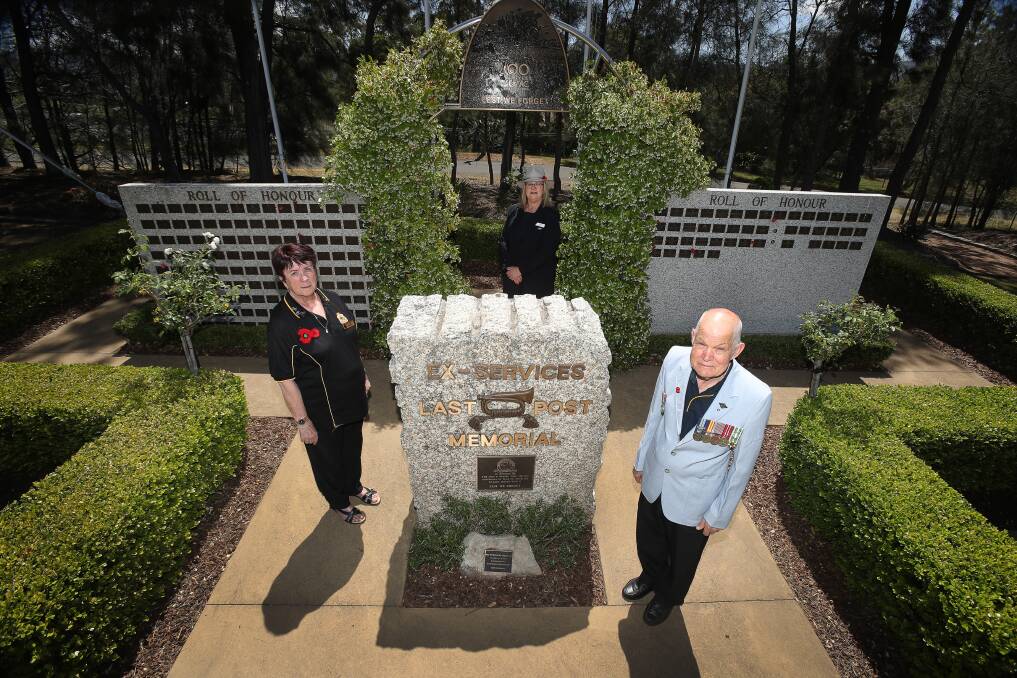 SALUTE: Mary Johnston OAM and Gary McDougall from Dapto-Port Kembla RSL sub-branch, with Lakeside Memorial Park manager Shirley Wilson Picture: Robert Peet.