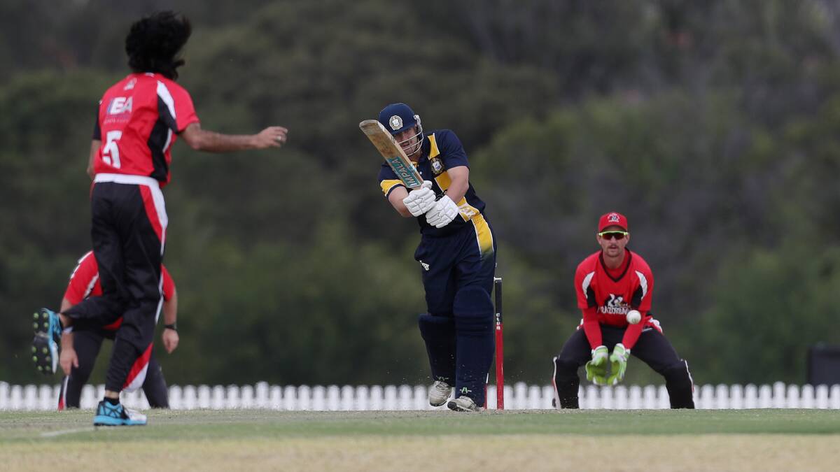Tough conditions: Lake Illawarra batsman Ryan Maguire. Picture: Robert Peet.