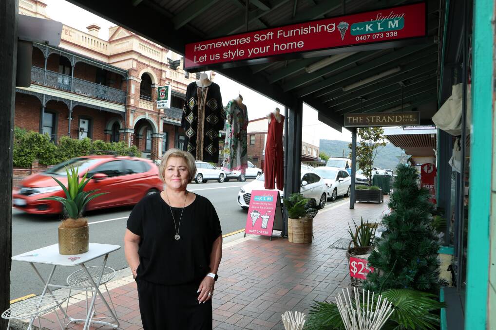 Parking problem: Kathryn McGuire owns KLM Styling on the Princes Highway at Bulli and is concerned about the idea that the on-street parking could disappear in moves to improve traffic flow. Picture: Sylvia Liber