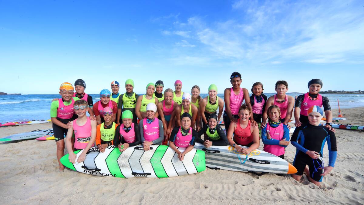 Ready to roll: The Warilla-Barrack Point junior surf lifesavers ahead of this week's Summer Iron Classic. Picture: Sylvia Liber.