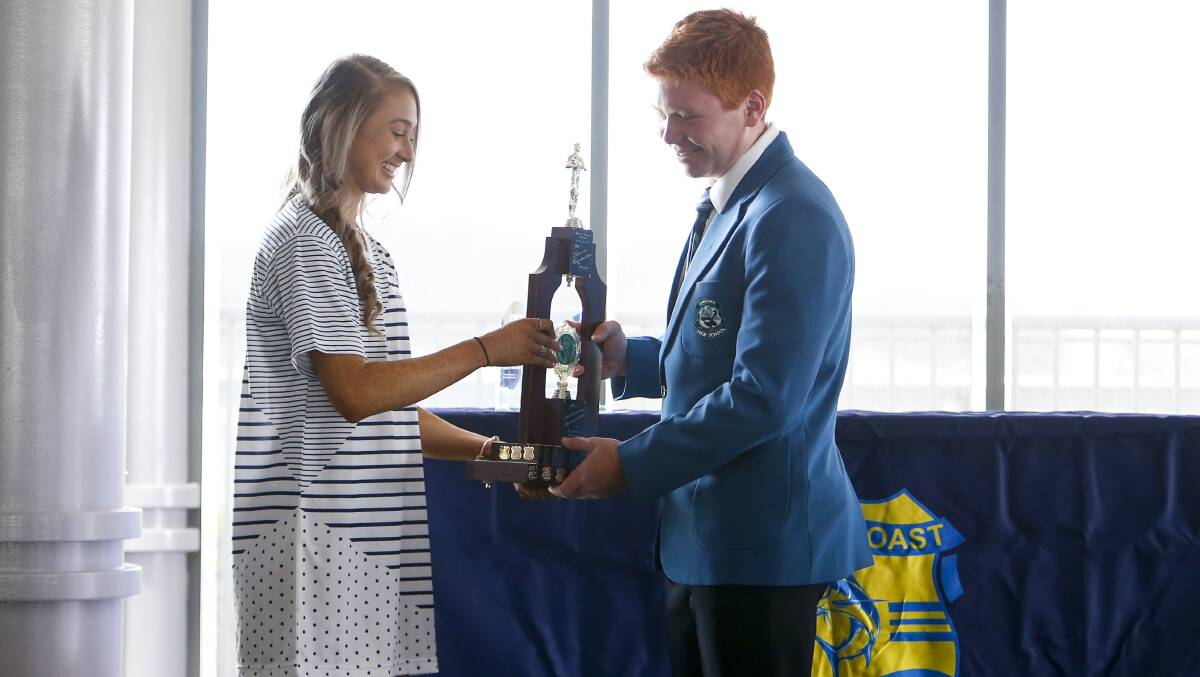Honour: Sam Wright-Smith is presented with a South Coast School Sport award by Jessica Hull. Picture: Anna Warr.