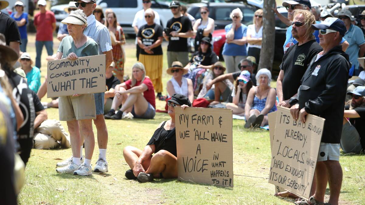 SIGN OF THE TIMES: Concerned residents make their point known during Sunday's Save Killalea Alliance rally at The Farm. Picture: Sylvia Liber