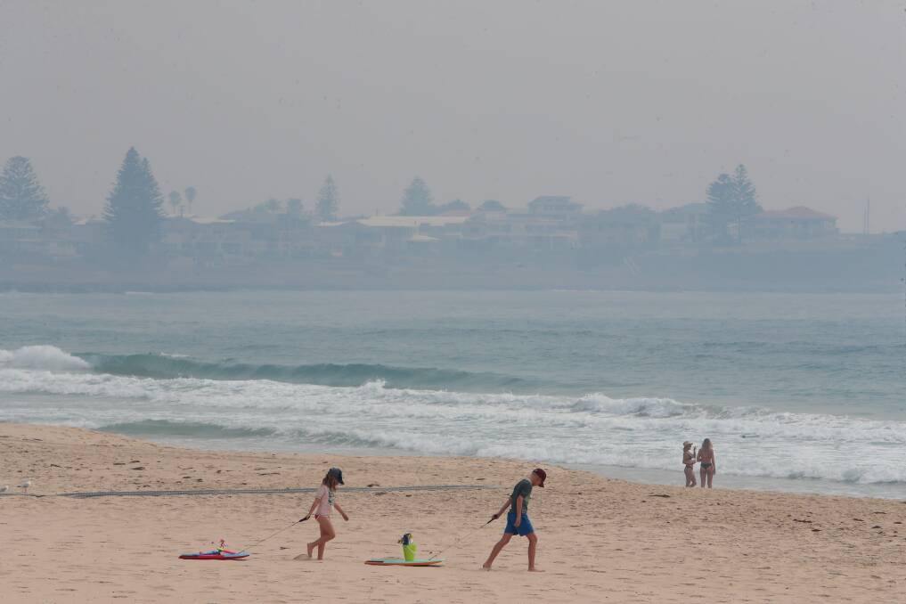 STRANGE DAYS INDEED: The view at Shellharbour beach on Thursday morning as bushfire smoke continues to blanket the Illawarra. Picture: Sylvia Liber.