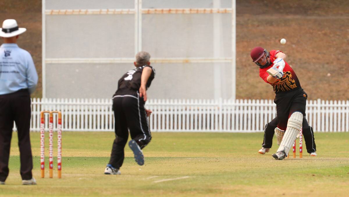 Going big: Keira batsman Ben Bourke takes the aerial route in Saturday's Twenty20 victory. Picture: Sylvia Liber.