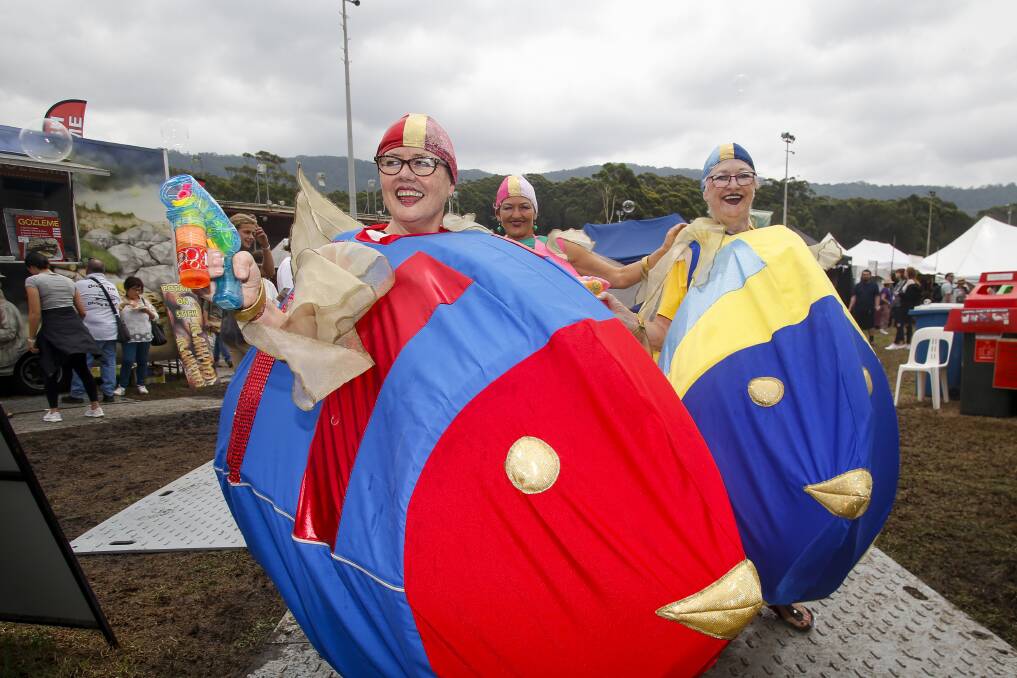 Bright: Ella Hogan, Angela Forrest and Lynda Willson from Circus Wow's Fish out of Water lent some colour to the folk festival proceedings. Picture: Anna Warr