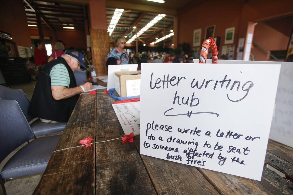 Letters: Festivalgoers at the Illawarra Folk Festival had the chance to send some good wishes to those affected by the NSW bushfires. Picture: Anna Warr