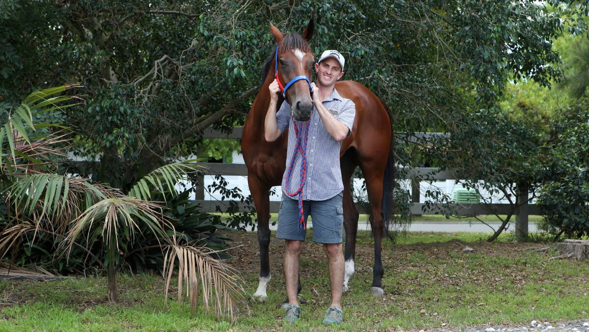Close bond: Trainer Luke Price with promising mare Tochi. Picture: Sylvia Liber