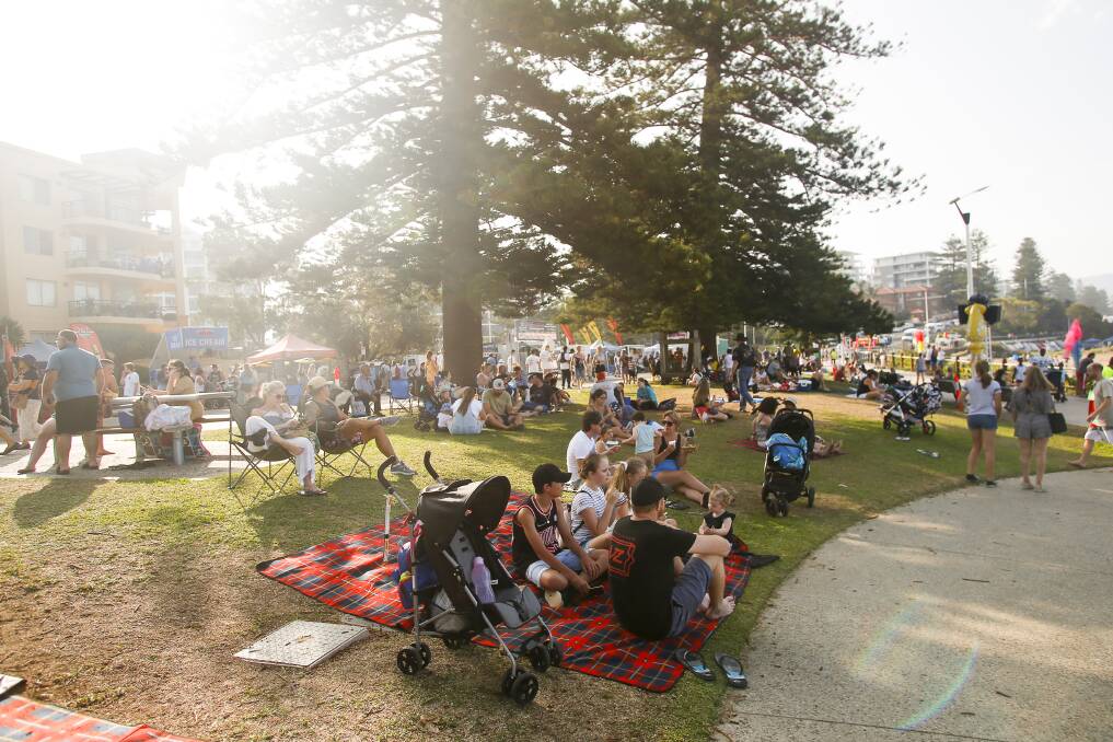 NOT HAPPENING: Wollongong's Belmore Basin is set to look far quieter than last January 26 (above). There will be no rides, no performers and no food trucks. Picture: Anna Warr