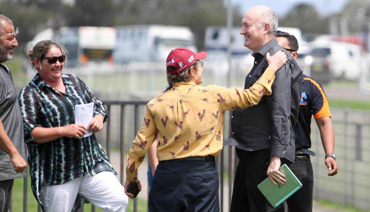 Got there: Stolen Glance owner Matthew Sandblom and trainer Gwenda Markwell enjoy a moment of celebration on Wednesday. Picture: Adam McLean