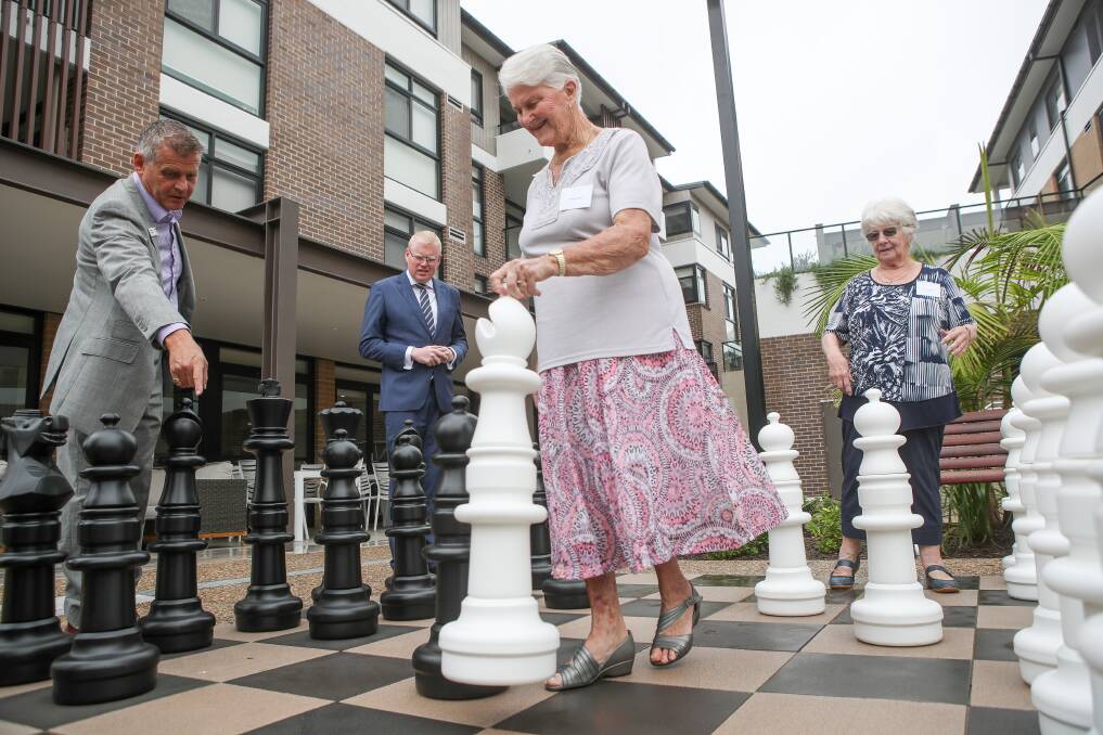 Good move: Uniting's Simon Furness and Communites Minister Gareth Ward play chess with Wallaroo Drive residents Shirley Fairfax and Sandra Gallagher. Picture: Adam McLean.