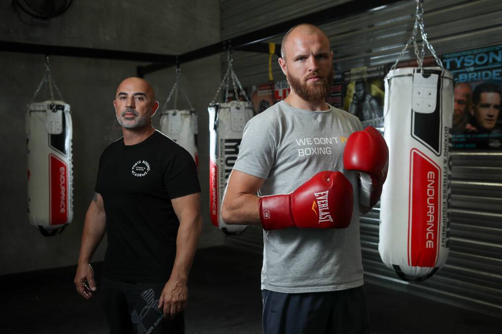 NO GAMES: Mark Lucas (right) and coach Nudge Mieli have issued a blunt callout to fellow Aussie middleweight Michael Zerafa. Picture: Adam McLean.