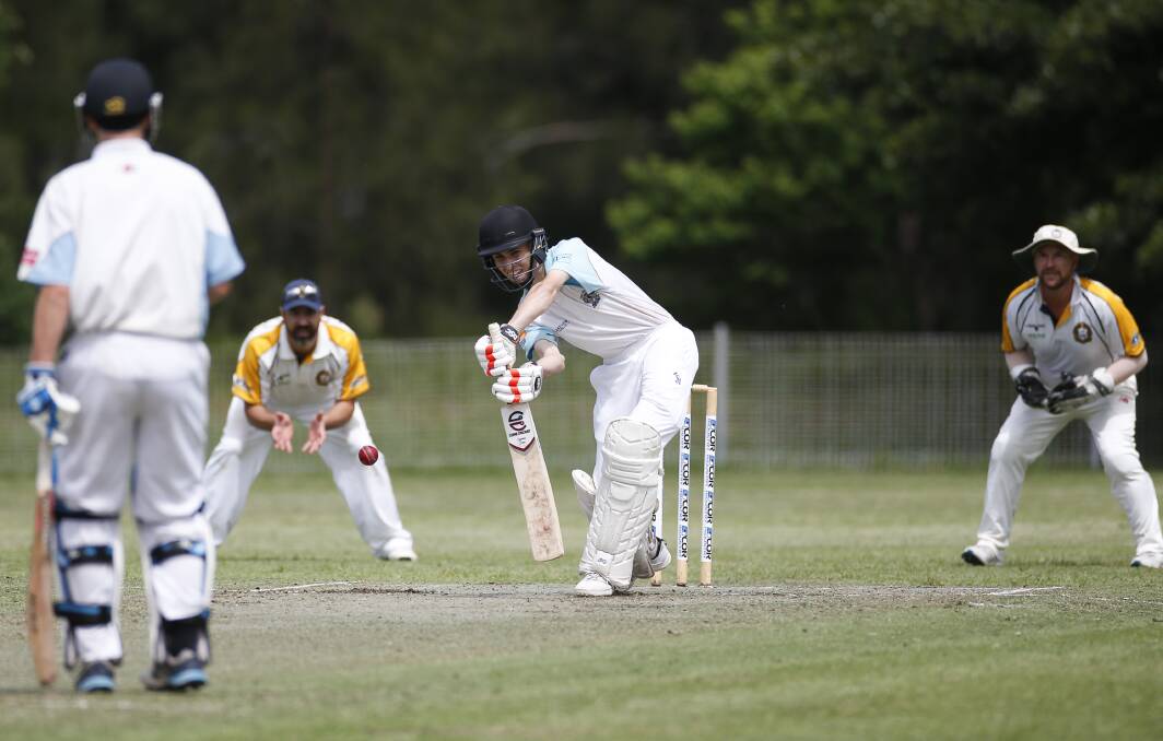 Straight bat:. Oak Flats batsman Liam Urszulak plays back down the pitch against Lake Illawarra on Saturday. Picture: Anna Warr