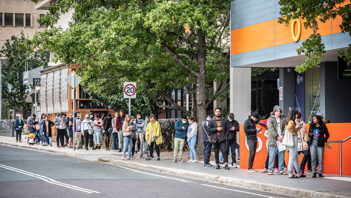 A queue at Centrelink in Woden after coronavirus restrictions forced workers into unemployment in March. Picture: Karleen Minney