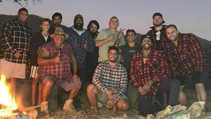 Instagram image of Latrell Mitchell and Josh Addo-Carr, third and fourth from right, on a camping trip. Photo: Instagram