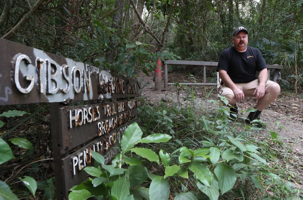CATMAN: Rob Brown at the start of the Gibson walking track in Austinmet, where he saw a large black feral cat on Tuesday. Picture: Robert Peet