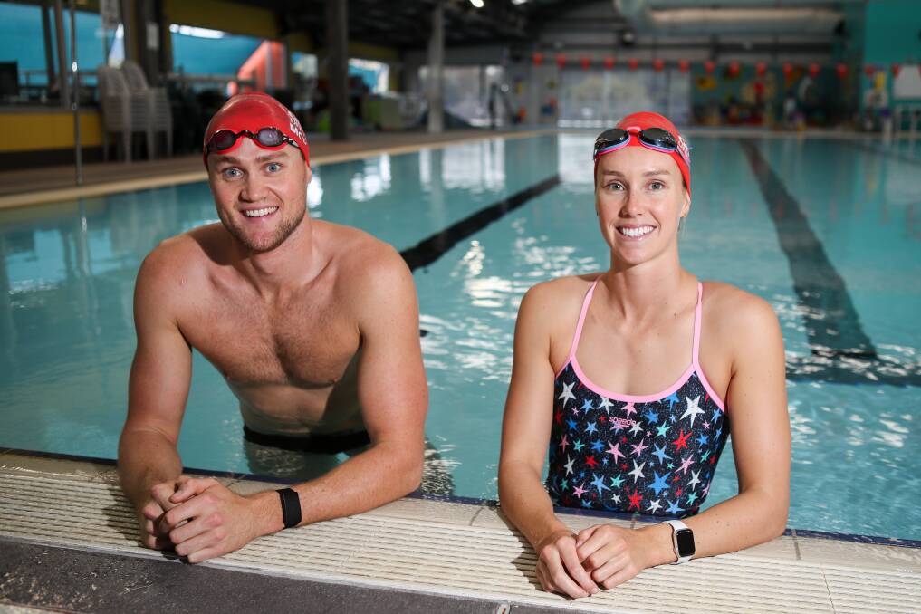 Familiar feeling: David and Emma McKeon have returned to the swimming pool. Picture: Adam McLean.