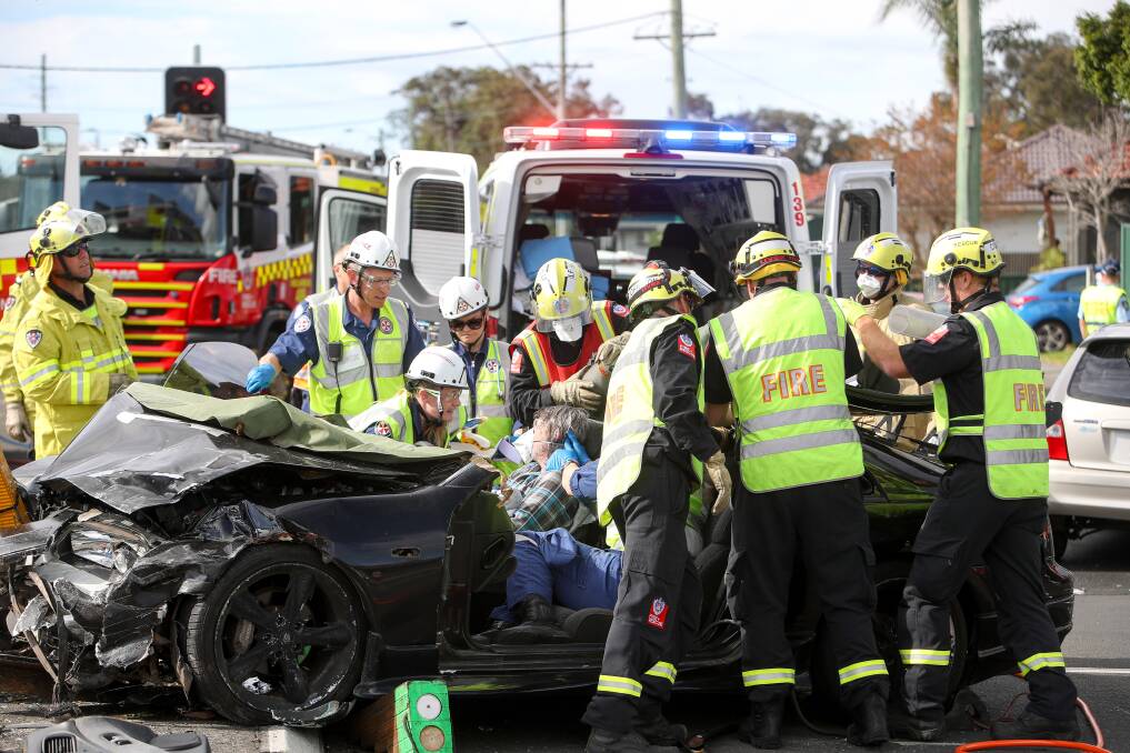 Crash: Emergency services at the scene of a serious car accident at Warilla in May this year .... statistics show a worrying rise in the number of speed-related fatalities in the Illawarra region. Picture: Adam McLean.
