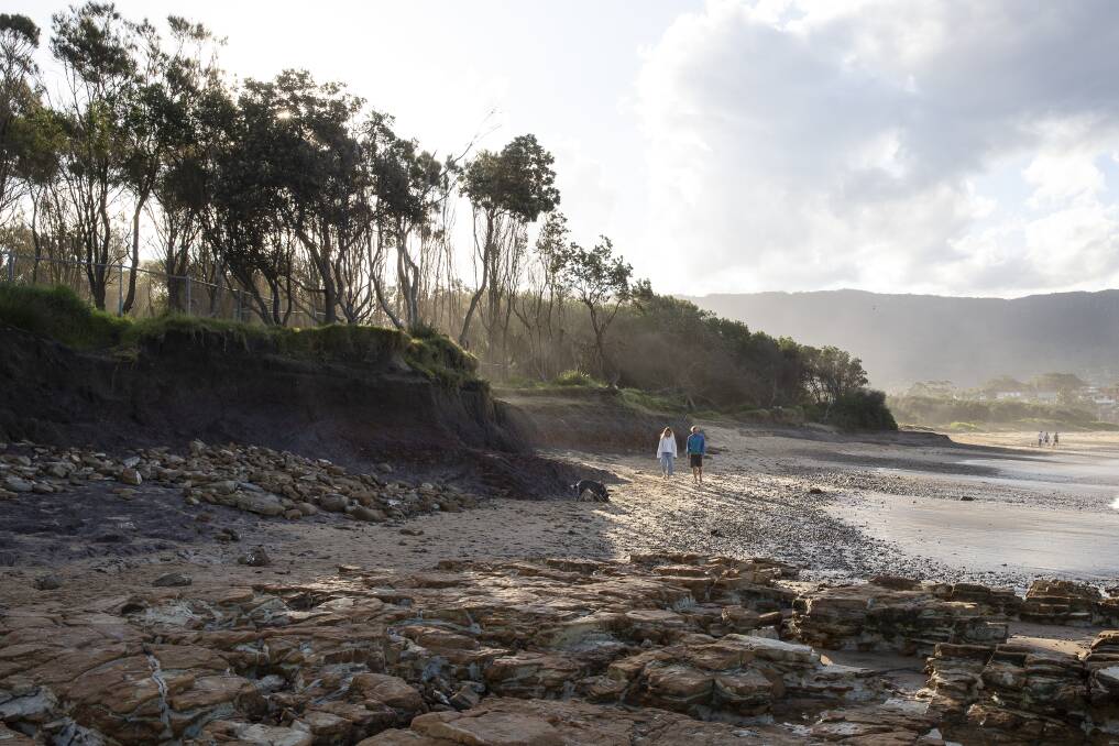 EXPOSED: The south end of McCauleys Beach has had most of the sand eroded away, revealing clay and rocks which lay beneath. Pictures: Anna Warr.