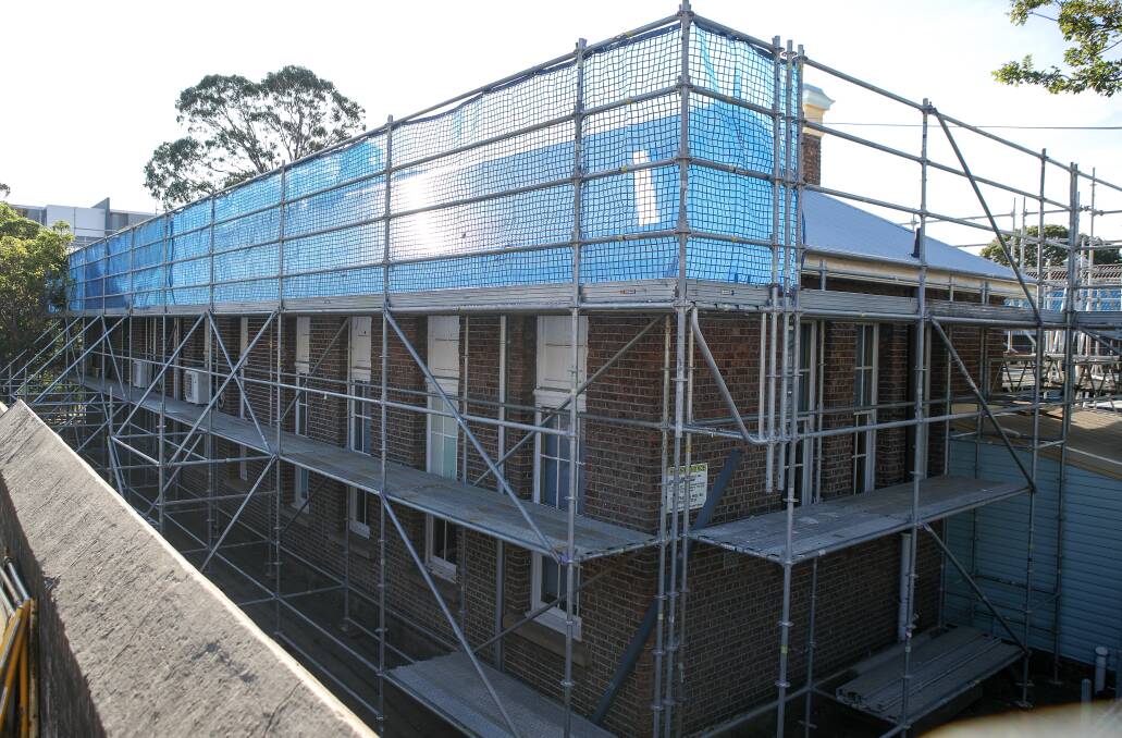 WORK HALTED: Work on the $9 million upgrade of Wollongong Public School has been halted due to heritage concerns with the choice of roof chosen. Picture: Adam McLean.