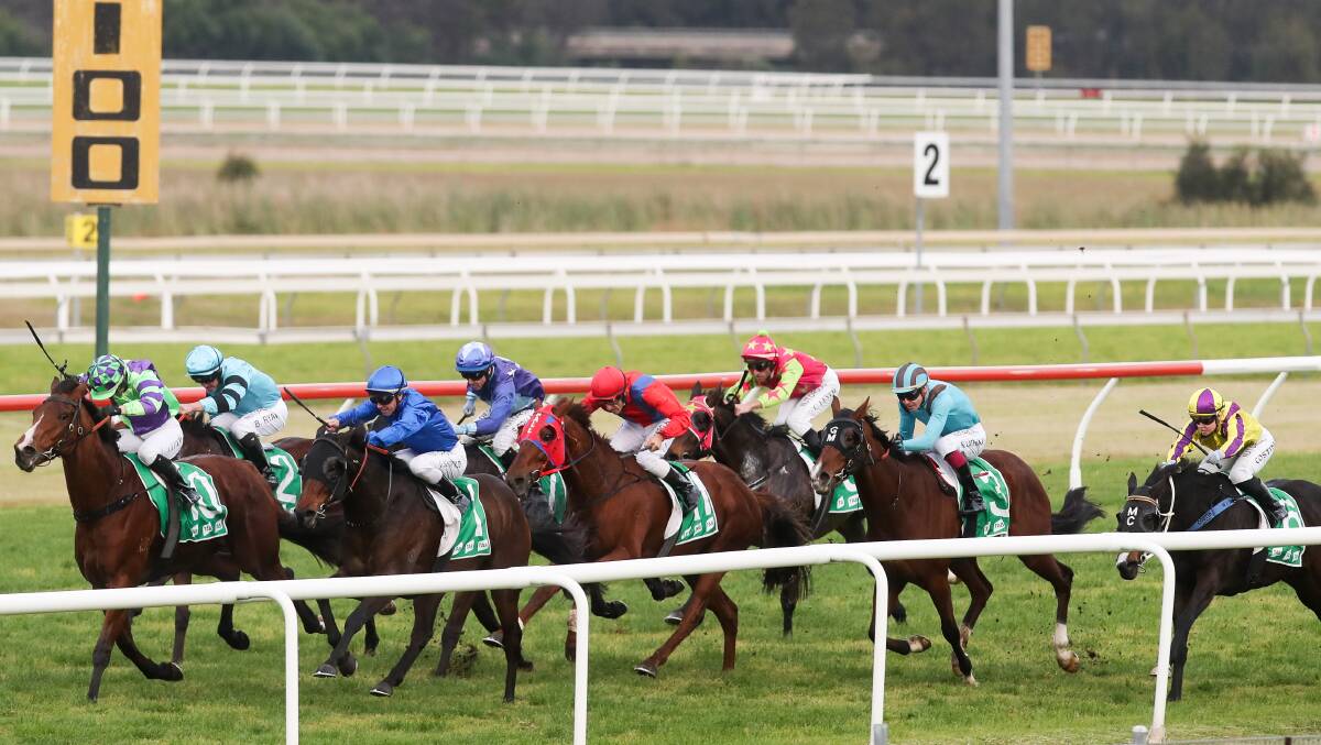 Down the outside: A wet track will likely see jockeys adopt differing tactics at Kembla Grange on Tuesday. Picture: Adam McLean.