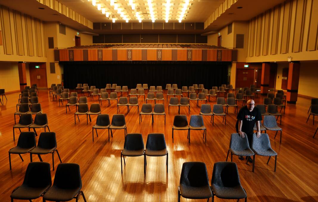Merrigong's Simon Hinton at the Wollongong Town Hall in June showing the social distancing seating arrangement. Picture: Robert Peet