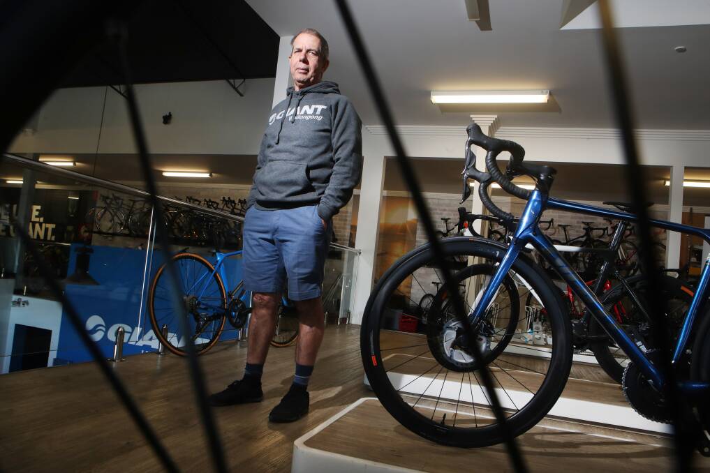 David Hansen from Giant Cycles Wollongong is in favour of Wollongong City Council's plans to push for a change in road rules to allow cyclists to ride on the footpath. Picture: Sylvia Liber