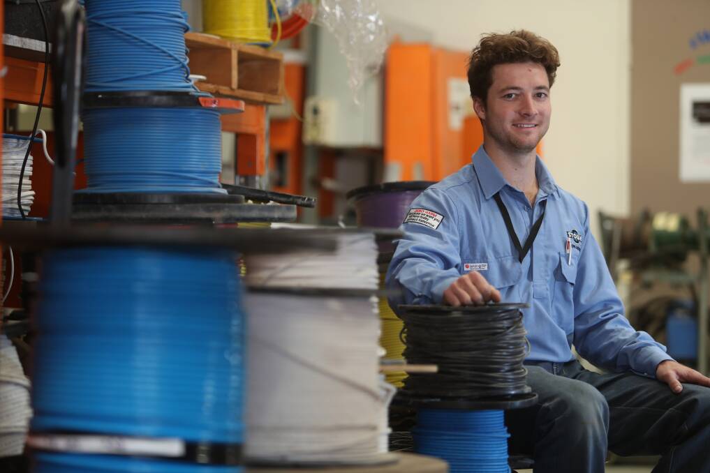 LIGHT IT UP: Stowe Australia electrician Cameron Taylor has been named the region's apprentice of the year. Picture: Robert Peet
