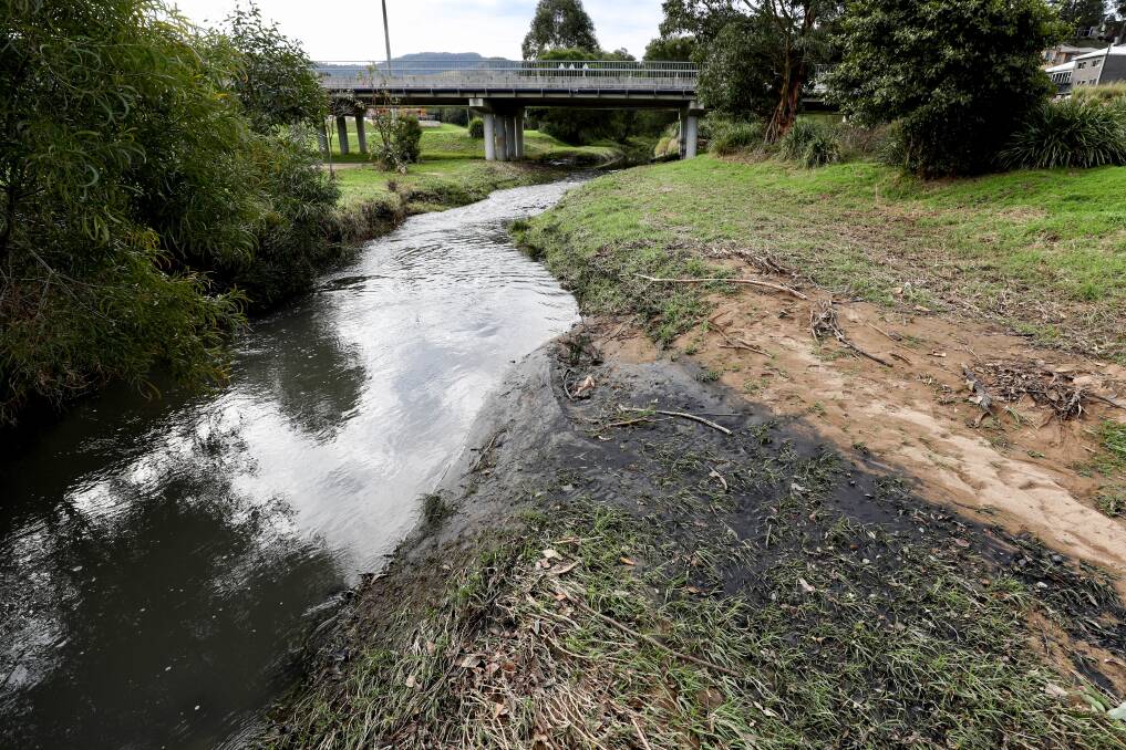 AWASH: Coal pollution from the Dendrobium mine in Brandy and Wine Creek before it becomes American Creek at Figtree. Picture: ADAM McLEAN.