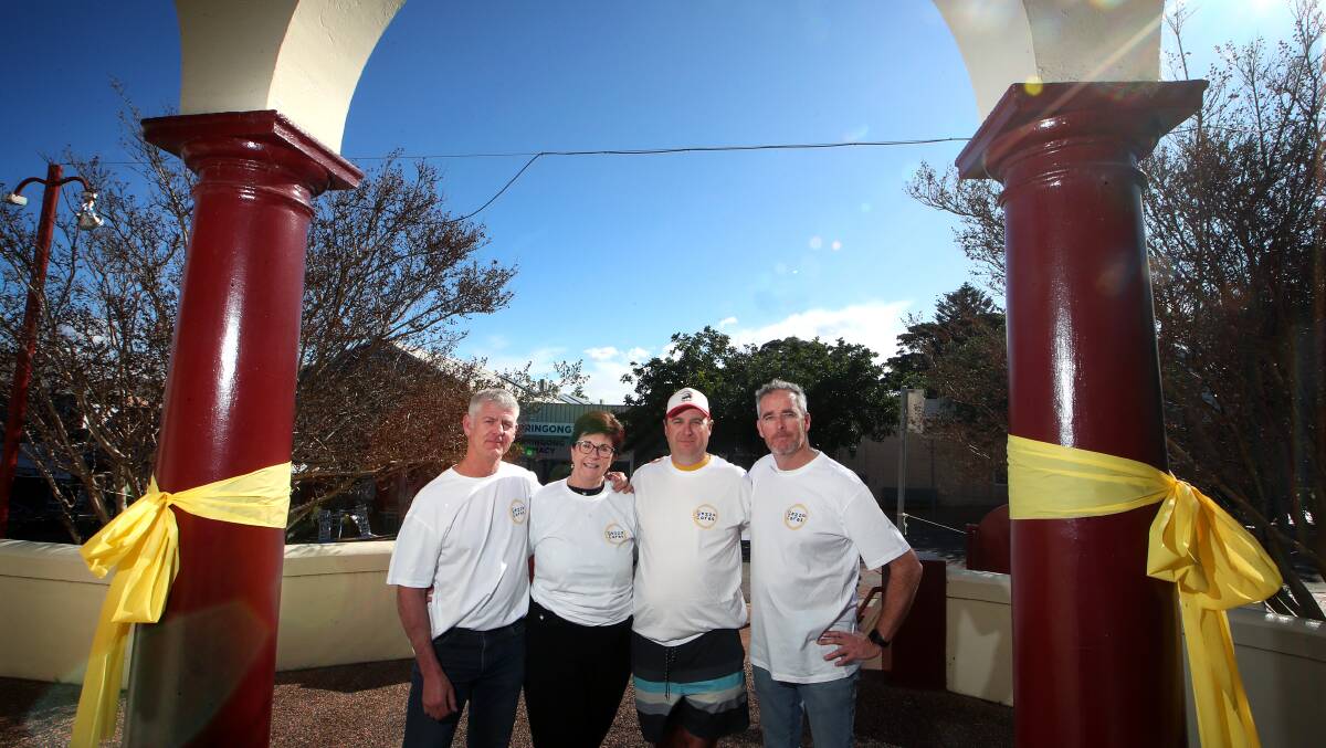 YELLOWING UP: Gezza Cares members Clay Barber, Maggie Dent, Shane Wicks and Derek McMahon. Picture: Sylvia Liber.