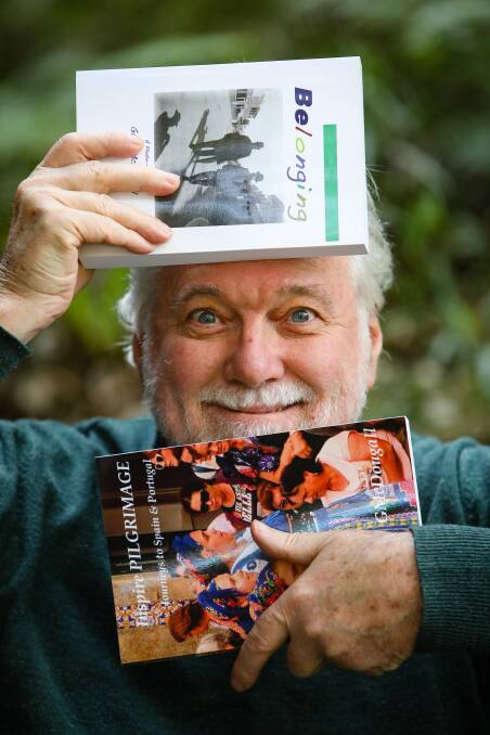 Bulli author Garry McDougall with some of the 20 books he has written. Picture: Adam McLean