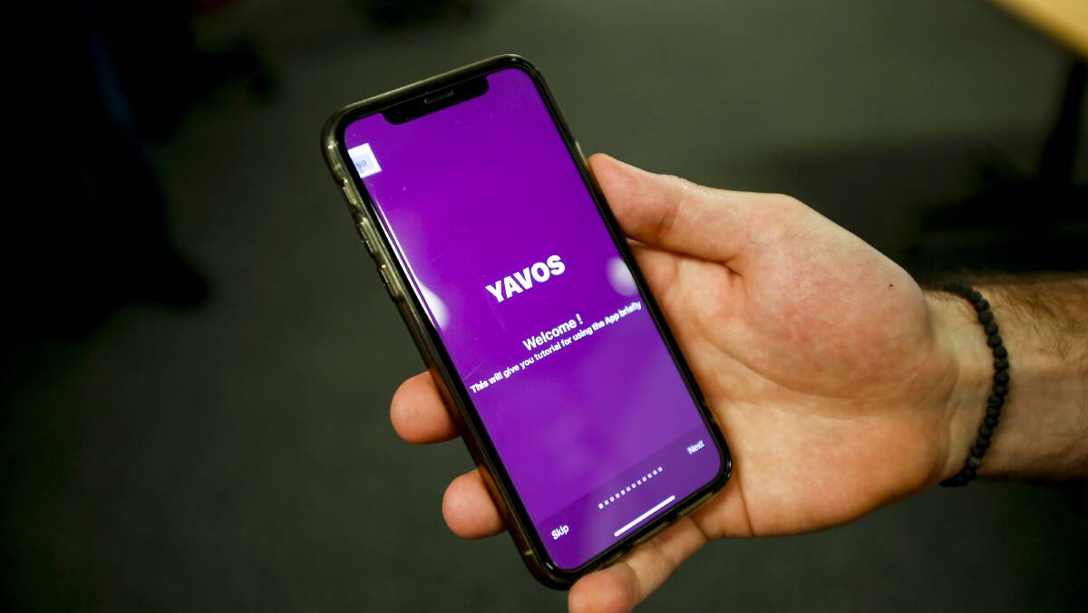 A group of UOW students deliver the YAVOS app, which they've designed to reduce youth reoffending to police and staff from Youth Justice. Picture: Anna Warr
