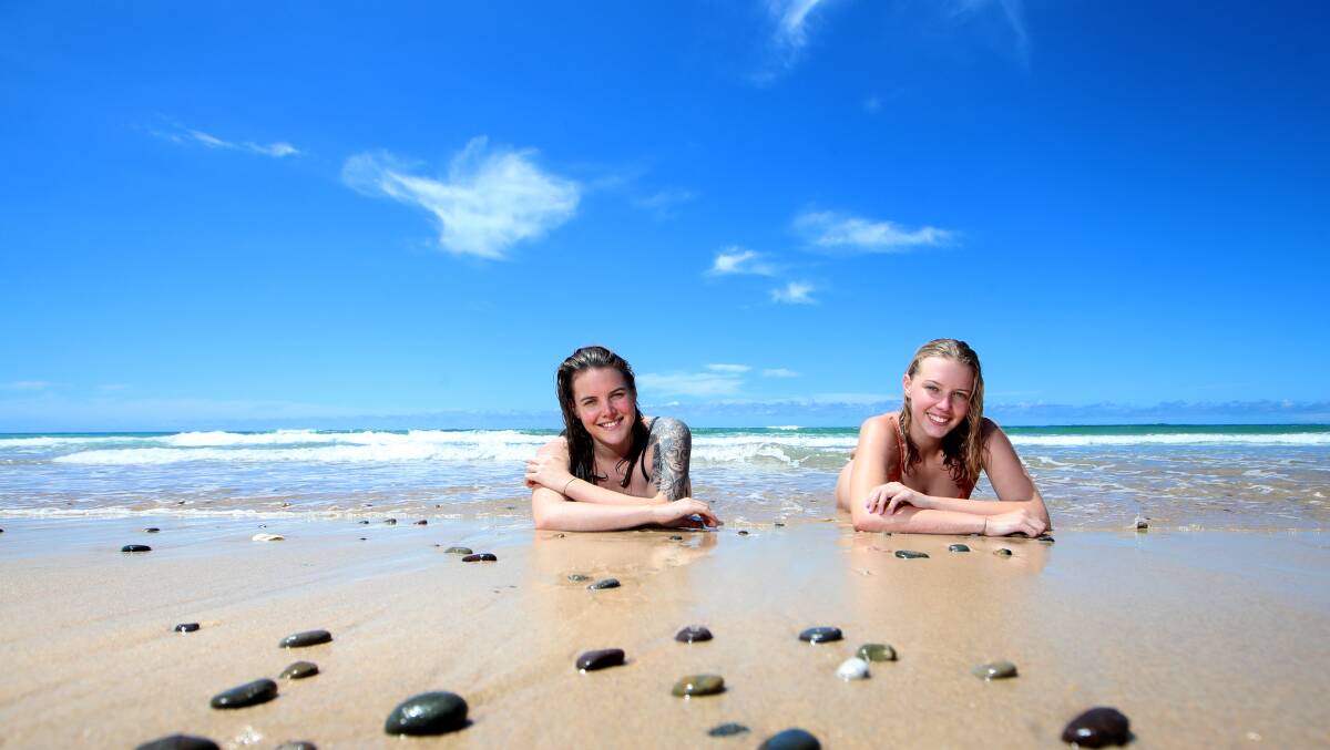 GREAT SPOT: Megan Wells and Amy Wells at Shellharbour beach. Picture: Sylvia Liber.