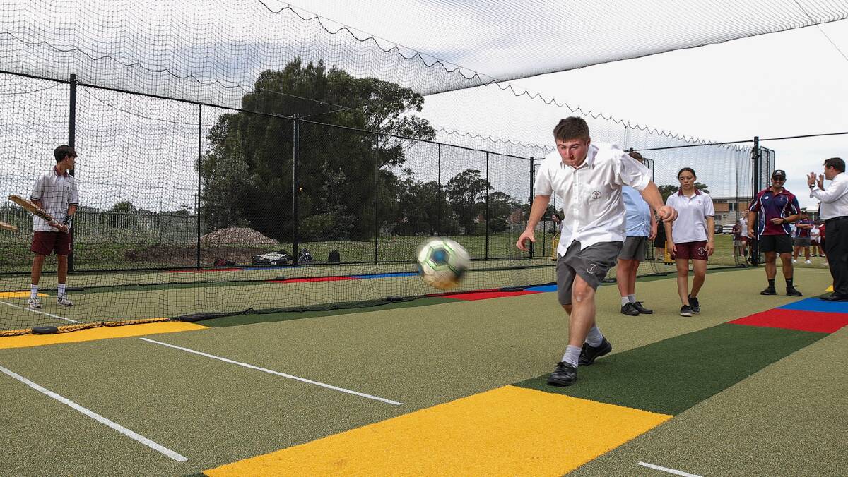 MULTI-PURPOSE: Holy Spirit College student James Phipps tries out the Bellambi-based school's new multi-purpose, all-weather sports facility. Picture: Adam McLean.