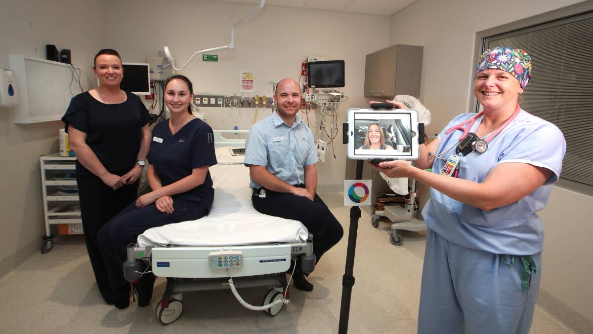 Kathleen Thomas (front), the ICU senior registrar at Wollongong Hospital with ICU nurse unit manager Bernie O'Brien and registered nurses Marissa Hales and Aaron Chadwick. Picture: Sylvia Liber.