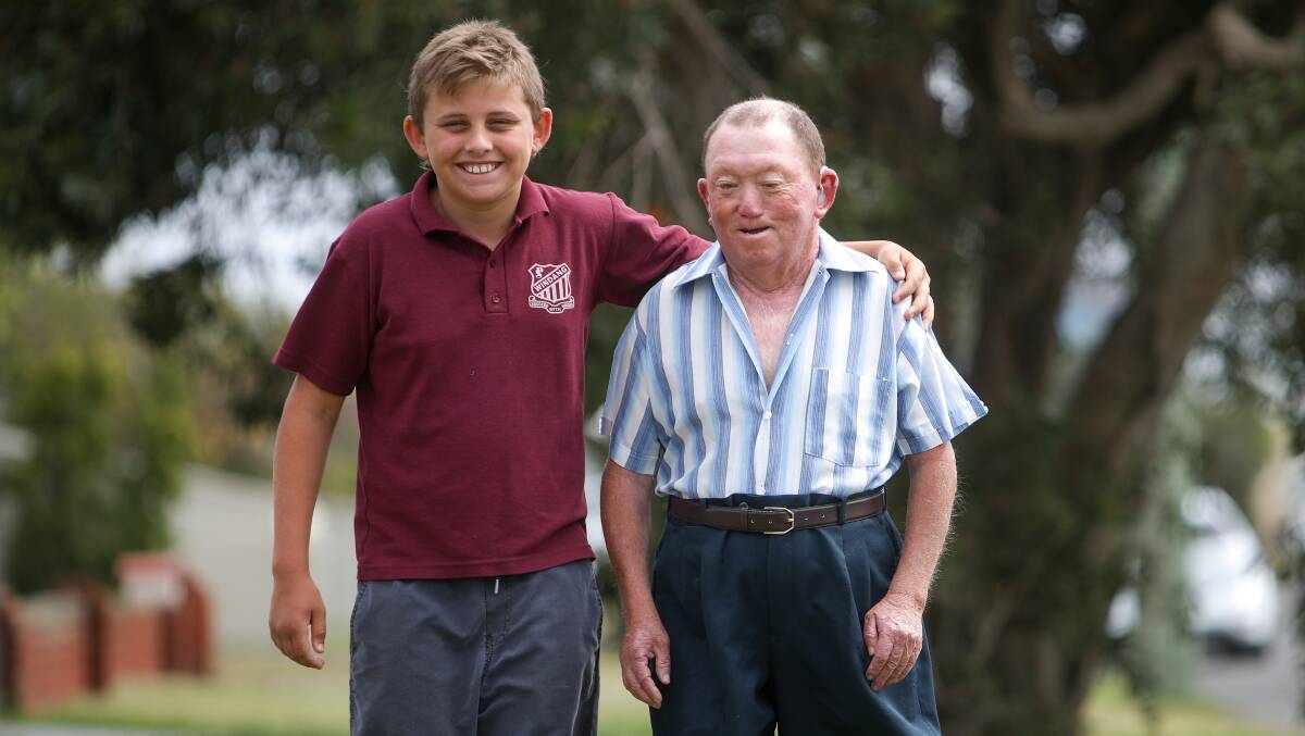 HELPING HAND: Kai Trott, 12 loves to help his mum Jessica look after her uncle Stephen Burton. Picture: Adam McLean.