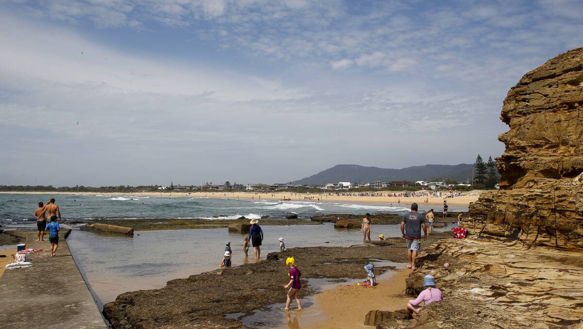 FAMILY TRAGEDY: The rocks next to Woonona Pool and beach. A 41-year-old man drowned after trying to save children who were swept off the rocks late Saturday afternoon. Picture: Anna Warr