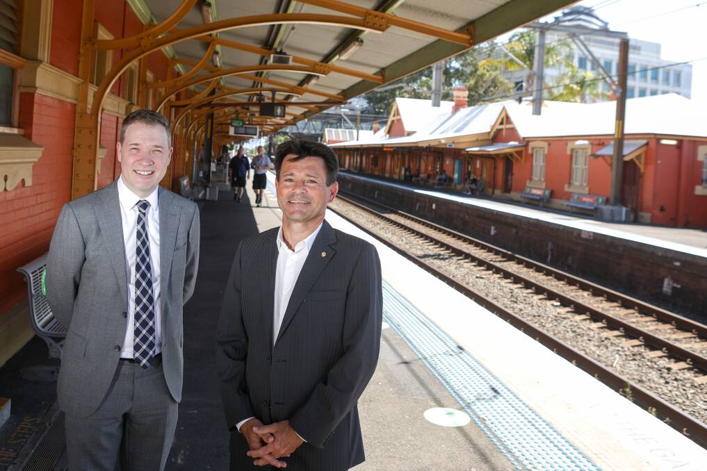 Illawarra First executive director Adam Zarth and University of Wollongong SMART Infrastructure director Pascal Perez at Wollongong station for the launch of a new rail proposal that could link the region to western Sydney. Picture: Adam McLean
