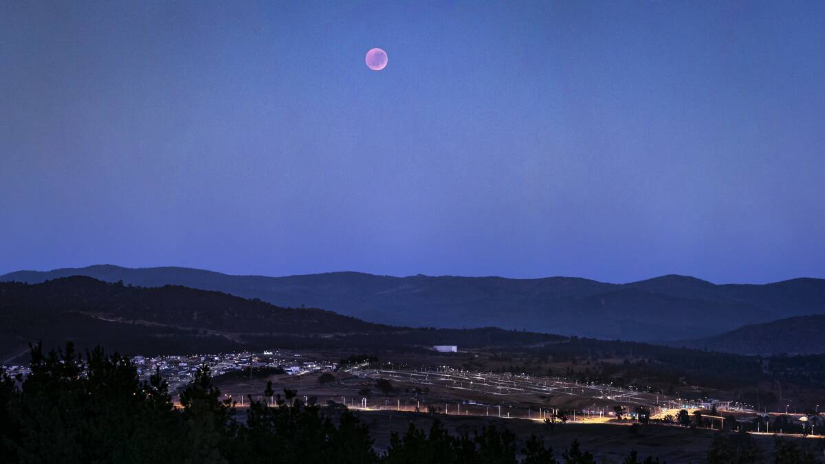 Ari Rex captured the previous Blood Moon over Canberra from the Arboretum, which he does not recommend for this event. Picture: Ari Rex