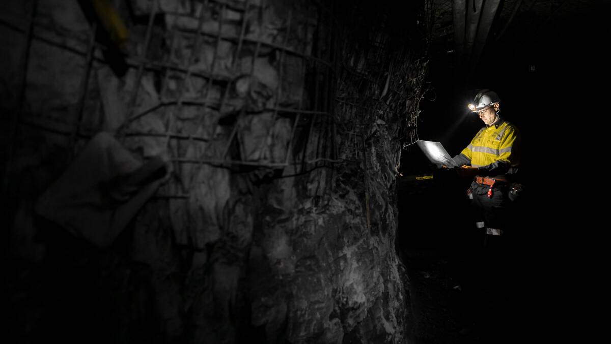 CLOSE QUARTERS: A worker underground at South32's Appin coal mine. The number of Covid cases has increased and an unknown number are isolating.