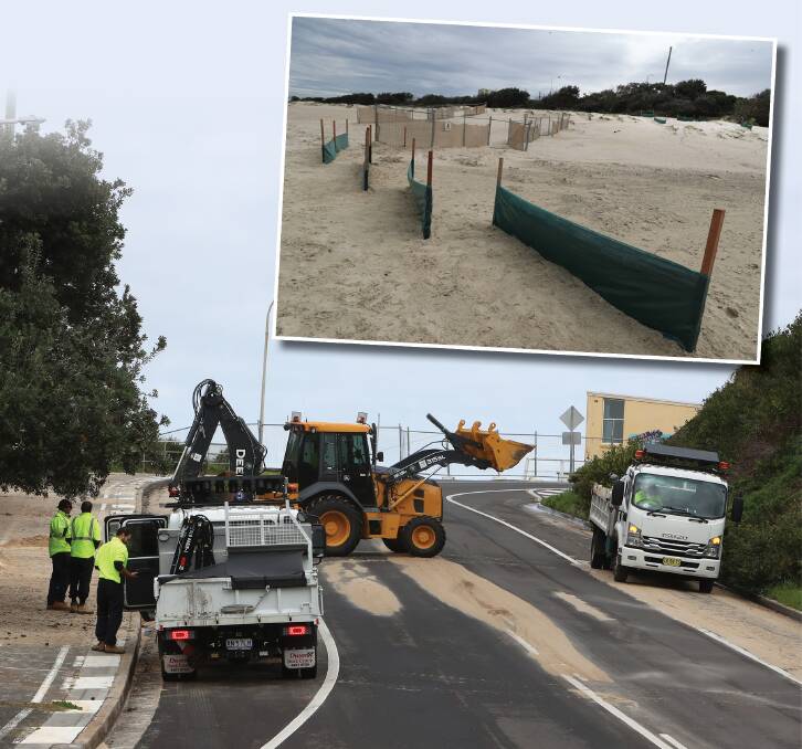 BLOWBACK: Clearing sand off Cowper St on Tuesday. INSET: The beach fences. Pictures: Sylvia Liber, Robert Peet.
