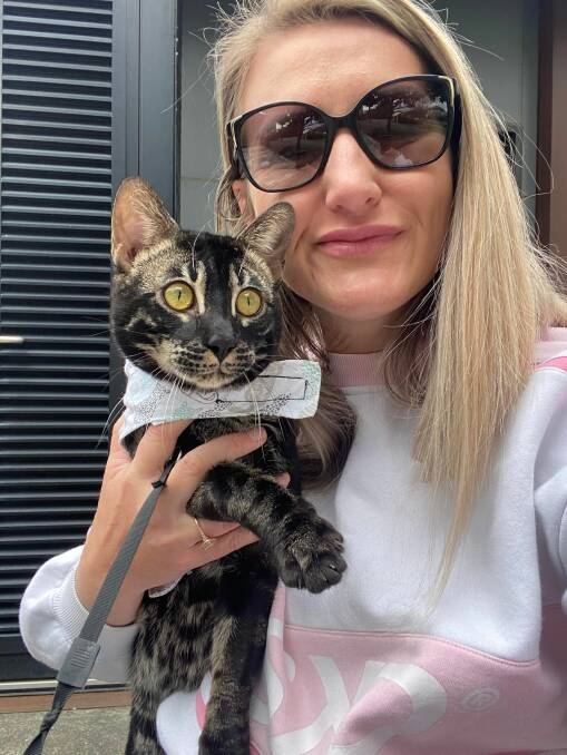 Barbie Farrugia with one of her cats from the Wild Valley Bengals breeding program she runs. Picture supplied. 
