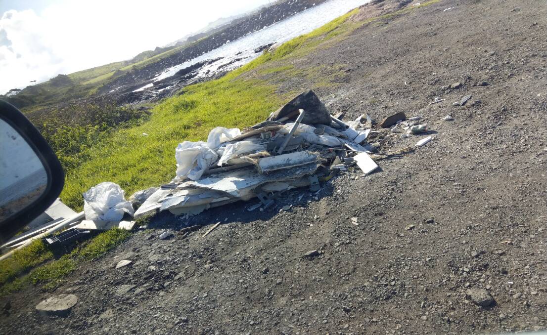 DIRTY DEEDS AT POINT: The load which included asbestos dumped at the Bass Point boat ramp this week. Picture: CAMERON GILBEY