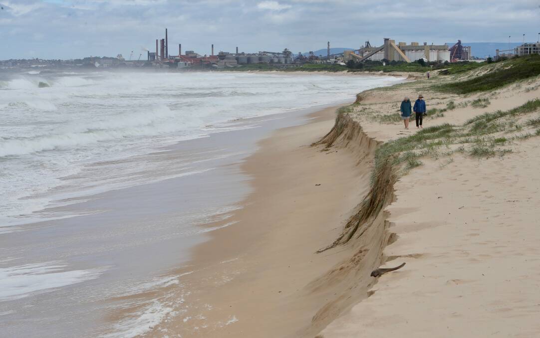 Scarping at City Beach in Wollongong following days of heavy seas. Picture: SYLVIA LIBER.