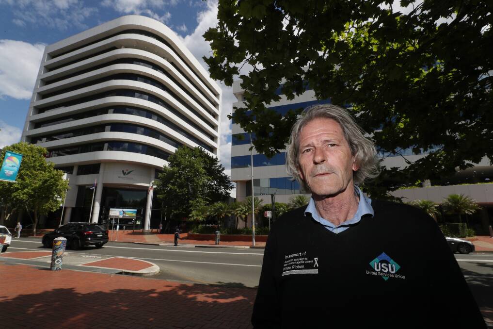 USU organiser Rudi Oppitz outside the council building on Wednesday. Picture by Robert Peet.