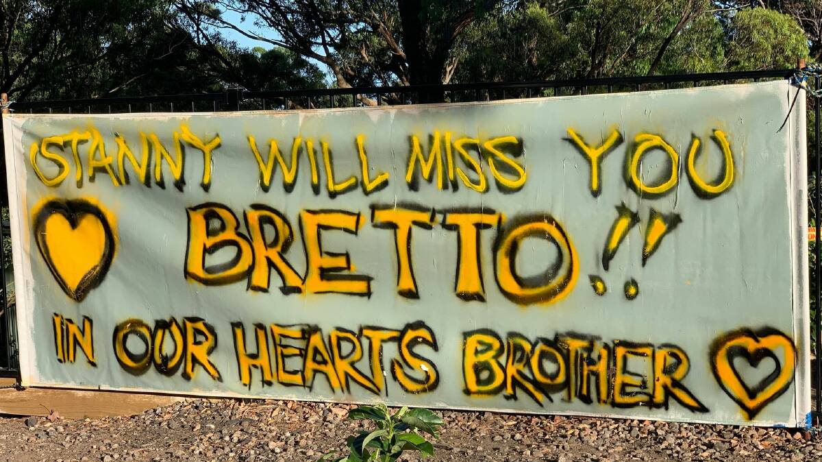 SAY IT OUT LOUD: One of the memorials to Brett Harris which has gone up near the centre of Stanwell Park. Picture: Luke Shanahan.
