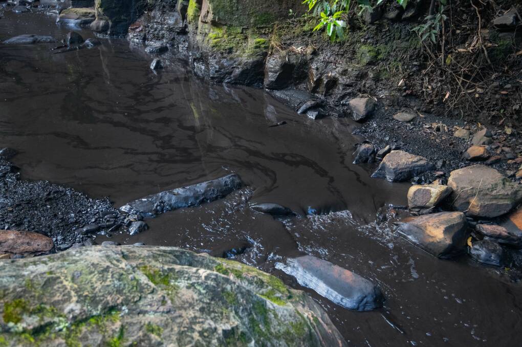 Gamp Gully Creek thick with coal sludge on September 7. Picture by Bob Crombie.