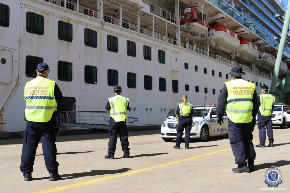 GANGWAY: Police guard the ship's entrance. Picture: supplied.