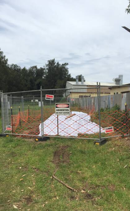 TEST IT, THEN TEST IT AGAIN: The dumped asbestos on Mineral Rd was fenced off before being removed within days. Picture: BEN LANGFORD.
